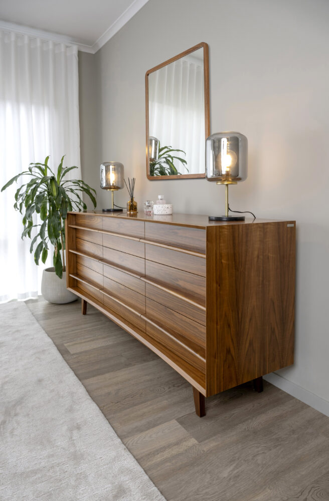 South Australian Made Dan Bedside Table Solid Timber Walnut with 9 drawers and in a home setting.