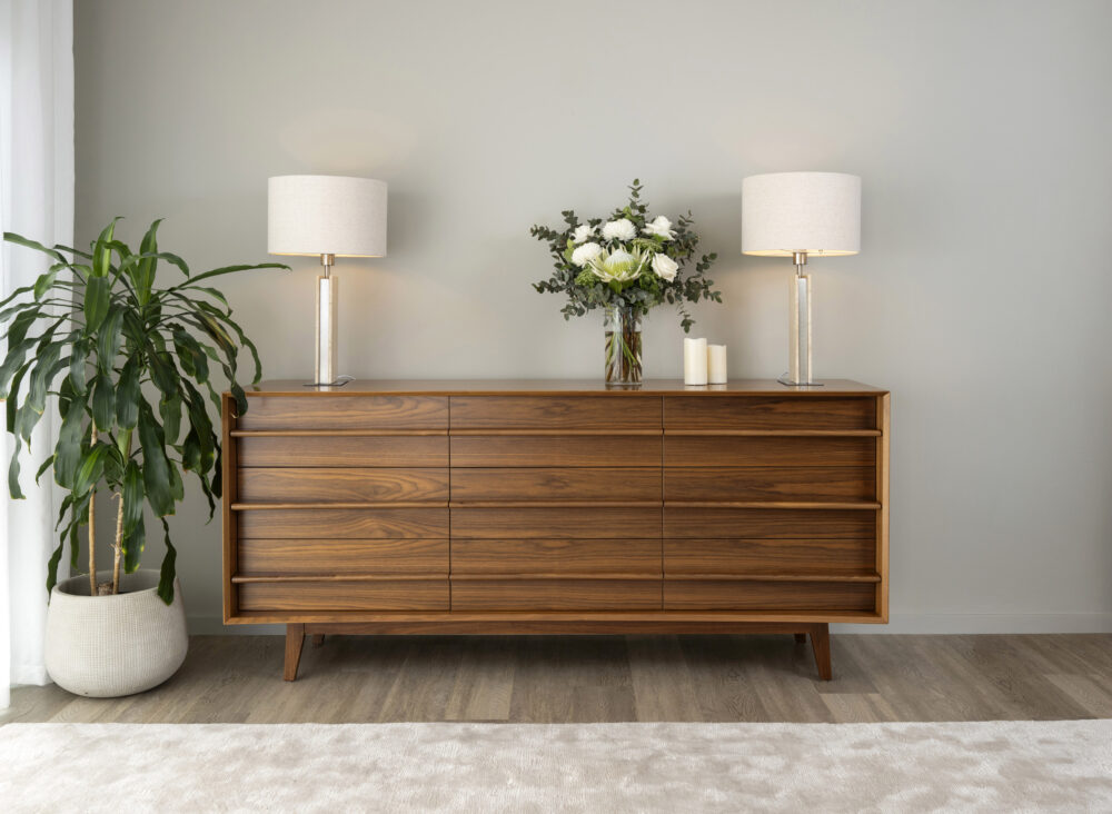 South Australian Made Dan Bedside Table Solid Timber Walnut with 9 drawers and in a home setting.