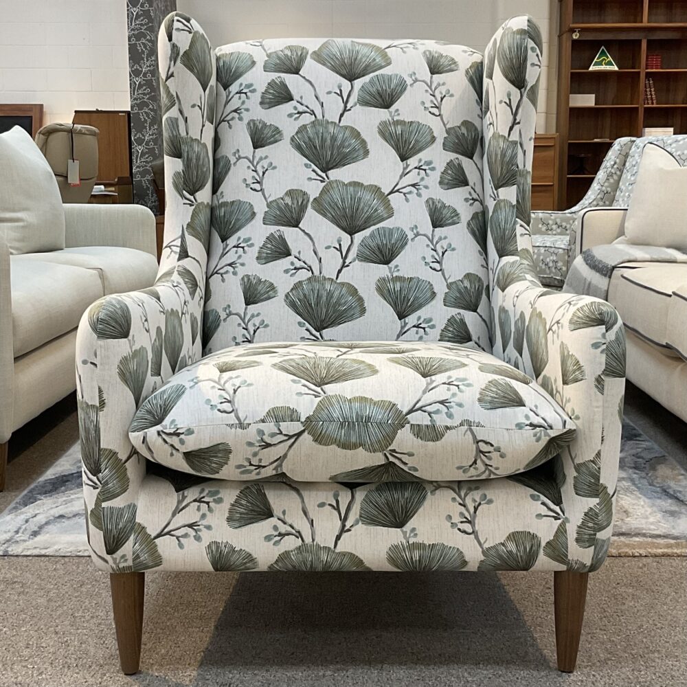 Molmic, Melbourne made fully pattern upholstered occasional chair with timber legs. View of front