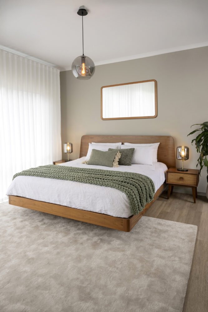 Adelaide, South Australian made solid walnut timber floating bed with curved bedhead. View of front