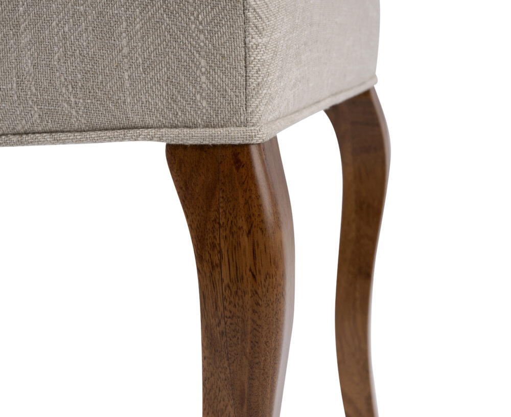 Adelaide, South Australian made solid timber traditional Bordeaux dining chair upholstered in neutral, view of leg detail.