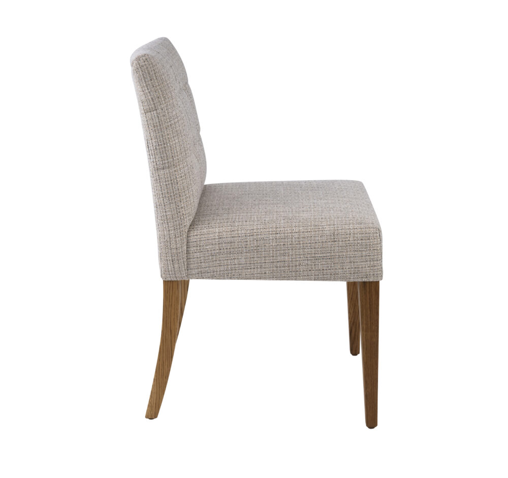 Adelaide, South Australian made solid timber Henley dining chair upholstered in fabric, view of side.