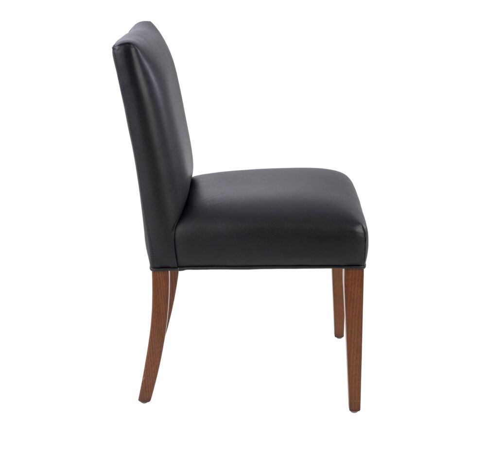Adelaide, South Australian made solid timber Leone Low Back premium dining chair upholstered in black leather, view of side.