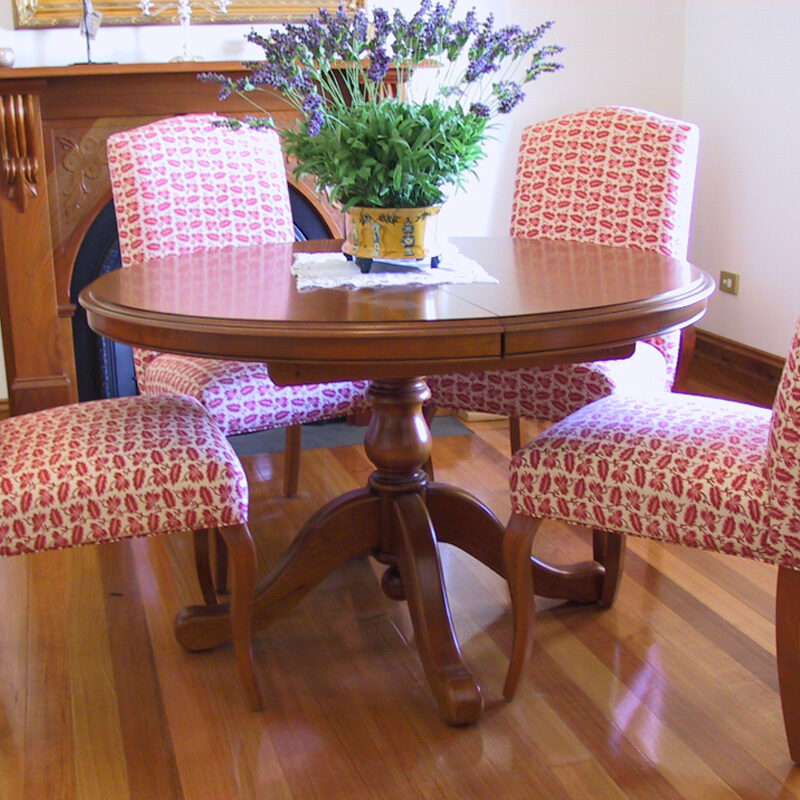 Macquarie round pedestal dining table in mahogony with chairs