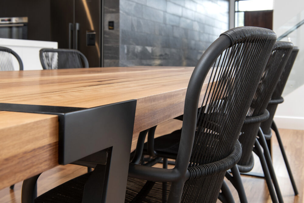 Solid timber top with powder coated stainless steel leg base + dining chairs