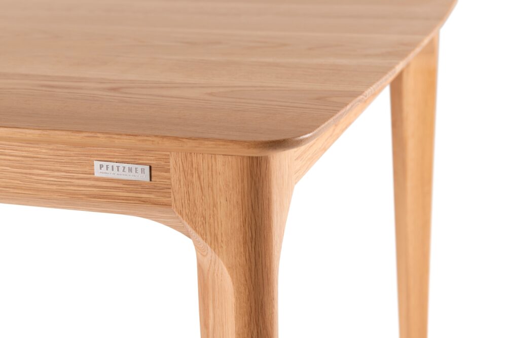 Dan Table American Oak - end detail pfitzner logo