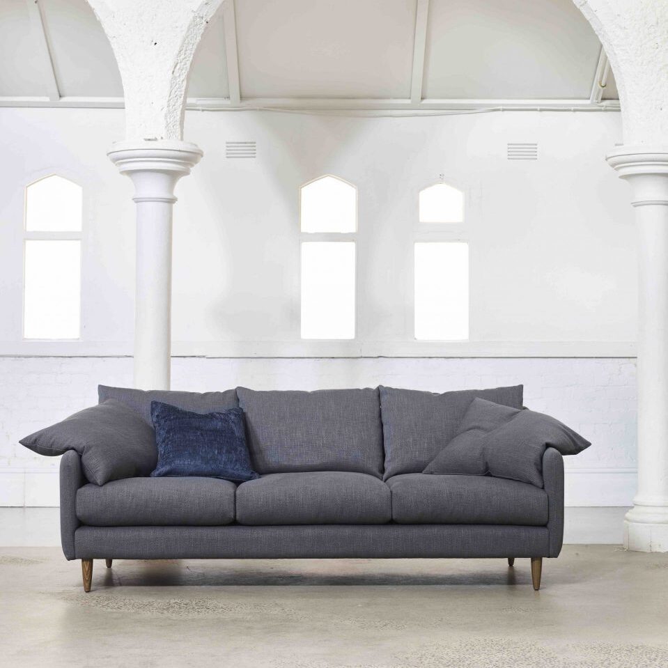 Floyd sofa lounge by Molmic with Danish feet and loose back cushions